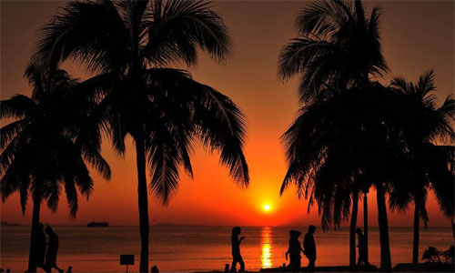 Tranquil moment as sun sets over Sanya skyline